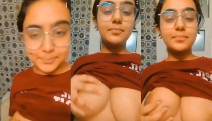 Cute girl in red Top showing her boobs